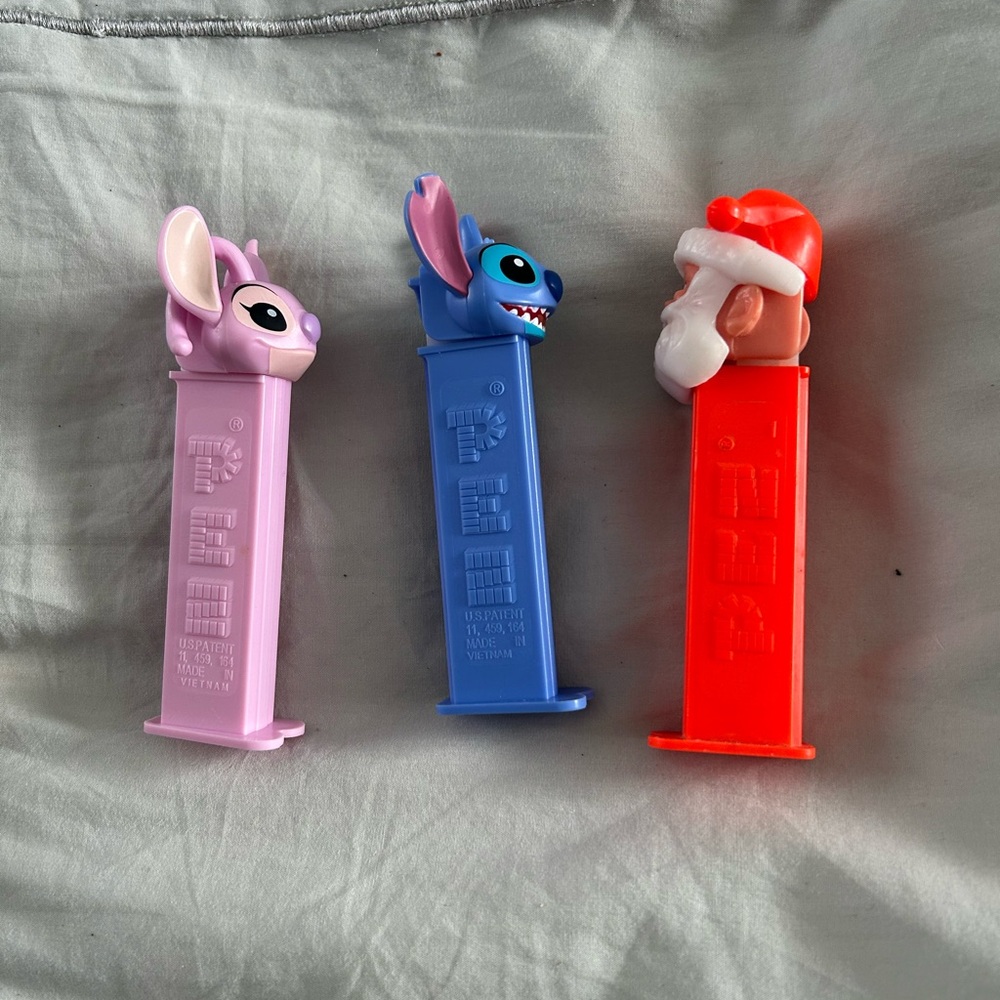 Pez Dispensers. Stitch,Angel andCandy Dispensers - Pink, Blue, Red Character Set